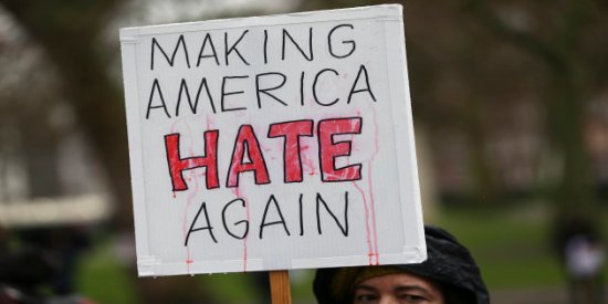 A demonstrator marches against U.S. President Donald Trump during a protest in London