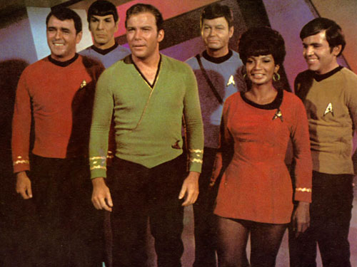 A variety of Star Trek uniforms
